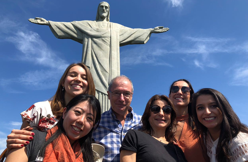 six people in front of christ the redeemer